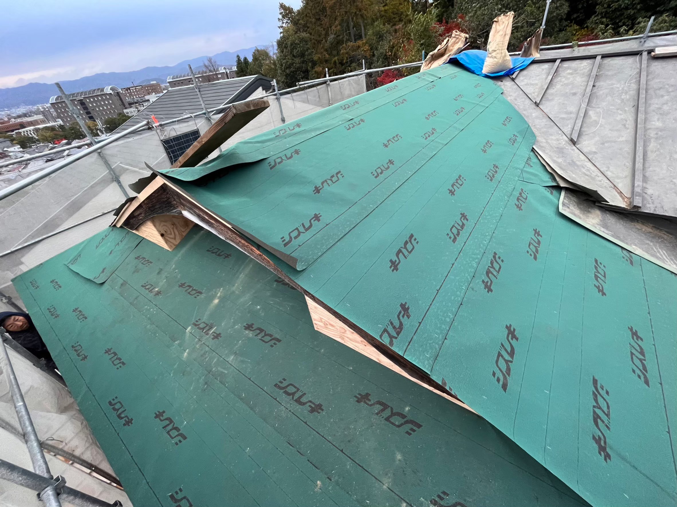 Waterproof sheeting installed